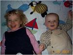 Laurel, and Hazen playing on the blanket